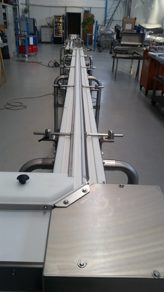 LINEA DI TRASPORTO FLACONI CON DIAMETRO Mm.20 CON TRASFERIMENTO LORTOGONALE E LATERALE