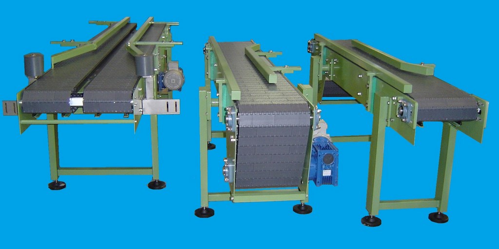 NASTRI TRASPORTATORI A TAPPETO MODULARE PER TRASPORTI GRAVOSI GENERICI